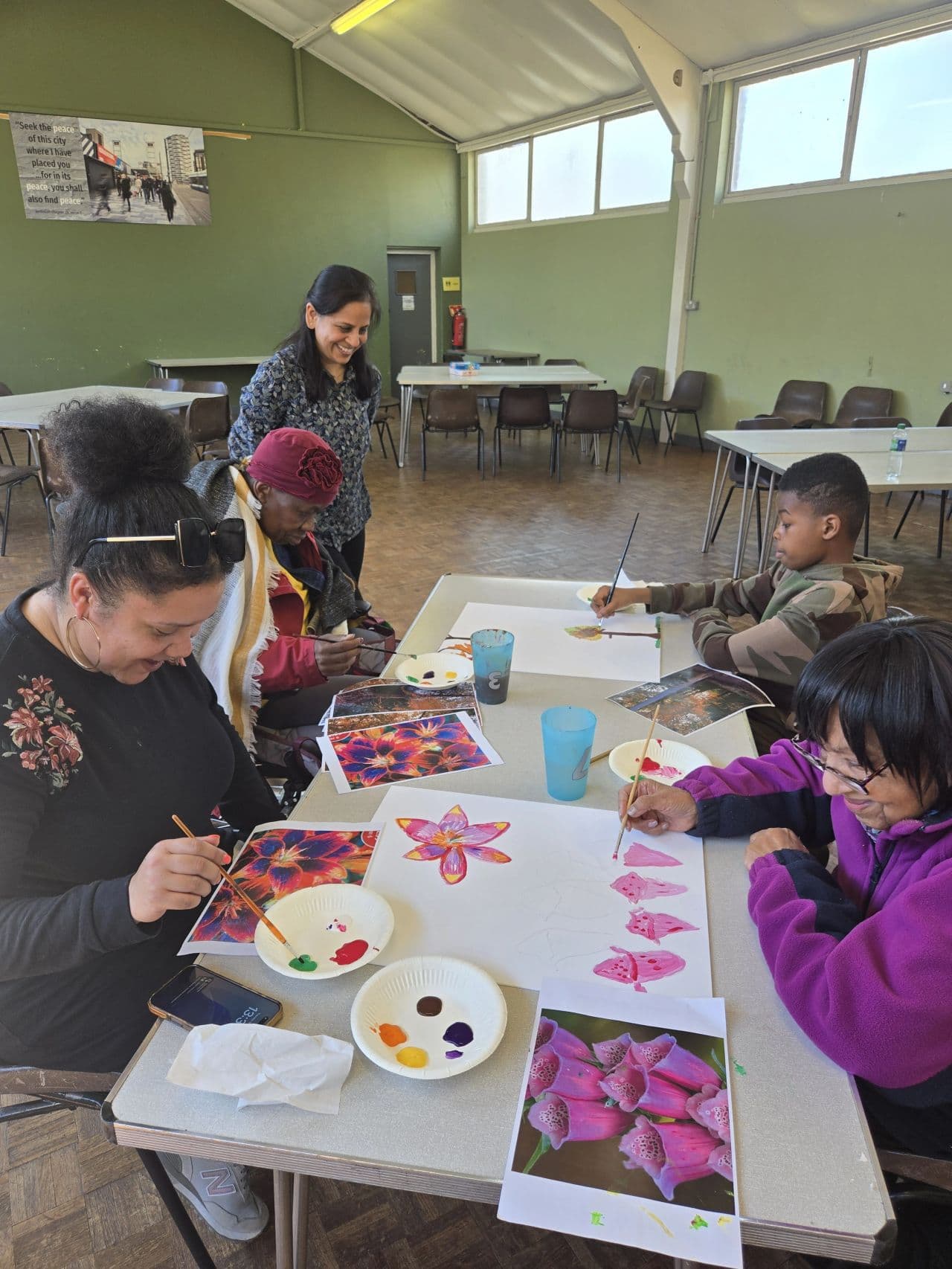 Intergenerational art workshop - group painting session