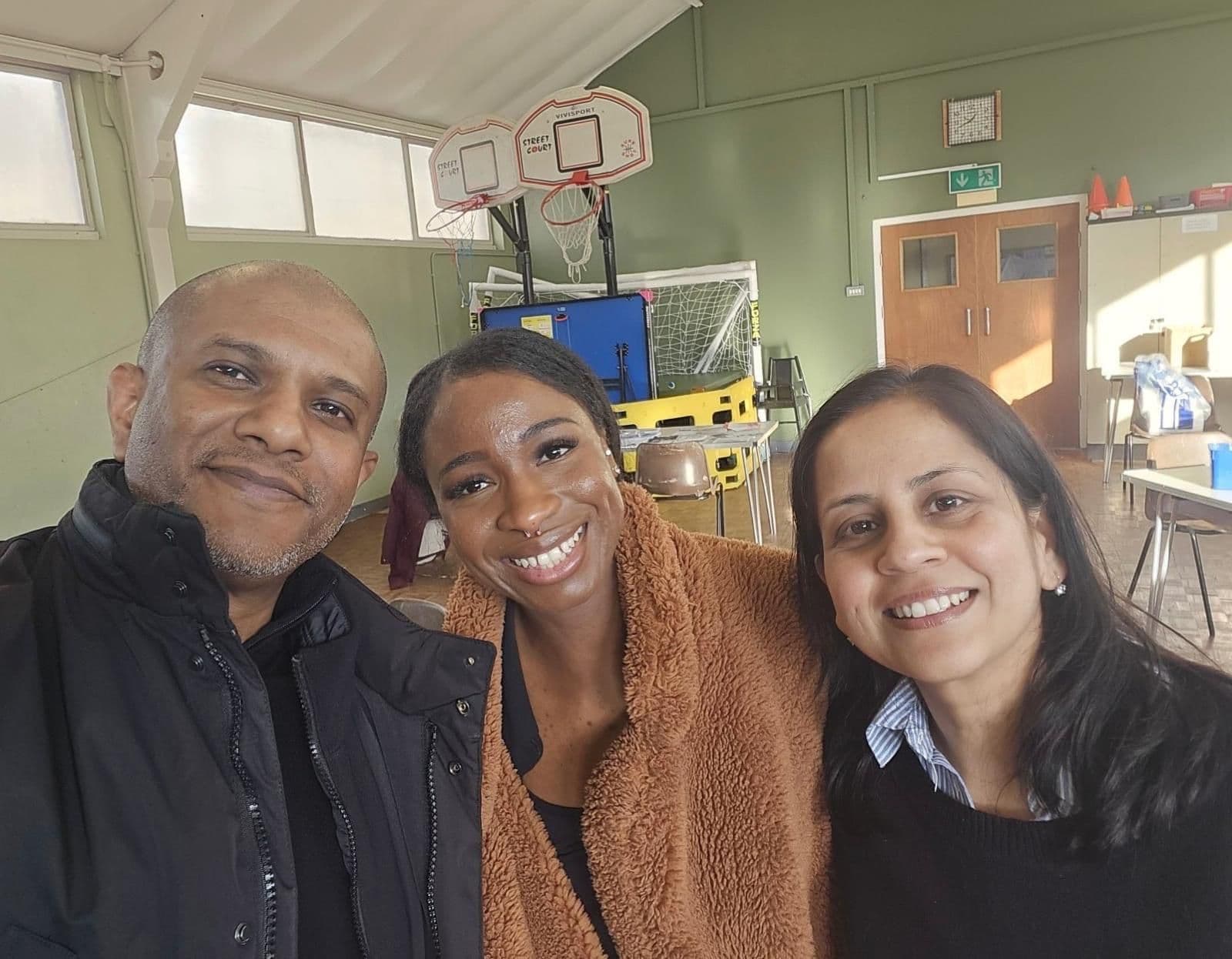 Elder and young person painting together